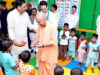 अन्नप्राशन कार्यक्रम में शामिल हुए CM योगी, बच्चों को खिलाया पहला अन्न, स्टॉलों का लिया जायजा