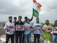 Bhopal Protest: पानी की टंकी पर चढ़े युवा कांग्रेस नेता, अमित शाह के इस्तीफे की मांग से मचा हंगामा