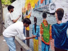 लखनऊ में ग्रैफिटी वॉल पर उकेरी नए उत्तर प्रदेश की तस्वीर